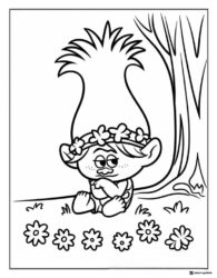 Trolls character with flower crown sitting under tree